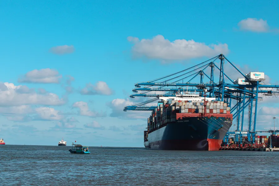 Container ship alongside cranes at Hai Phong International Container Terminal